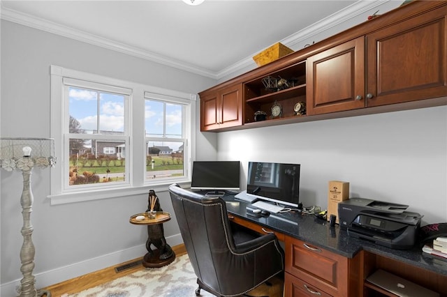 office area featuring light wood-type flooring and ornamental molding