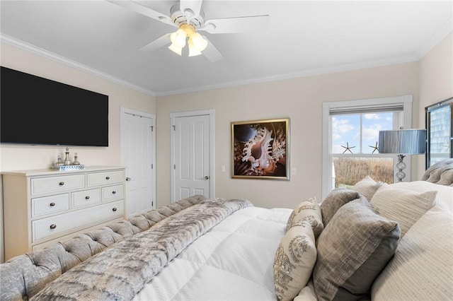 bedroom featuring ceiling fan and ornamental molding