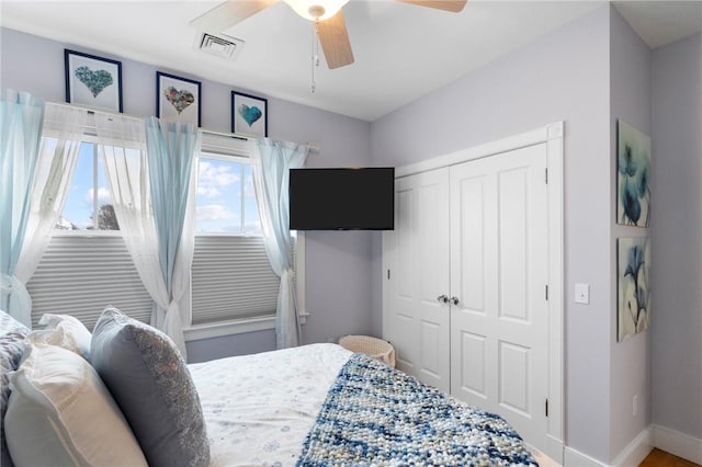 bedroom with a closet and ceiling fan