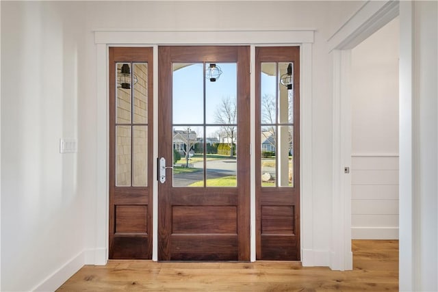 doorway featuring wood-type flooring