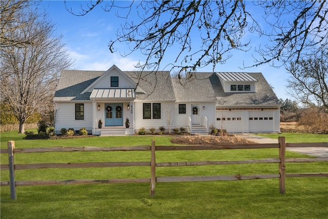 view of front facade featuring a garage and a front yard