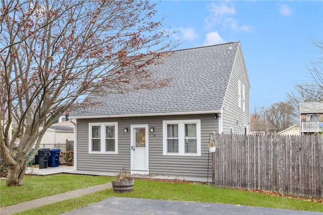 view of front of home with a front yard