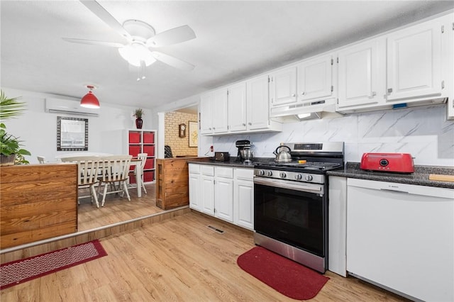 kitchen featuring white cabinets, decorative backsplash, stainless steel stove, and white dishwasher