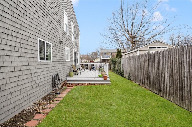 view of yard with a wooden deck