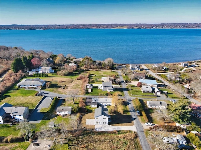 aerial view with a water view and a residential view