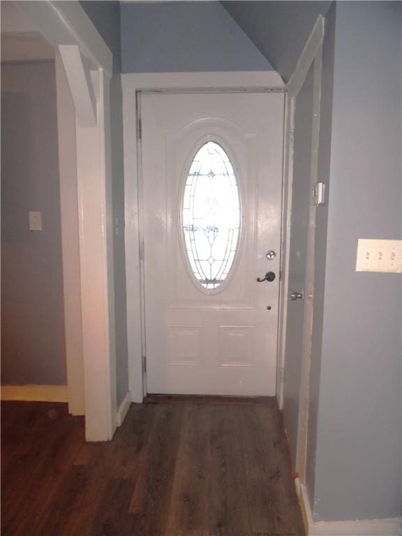 doorway to outside with dark hardwood / wood-style floors