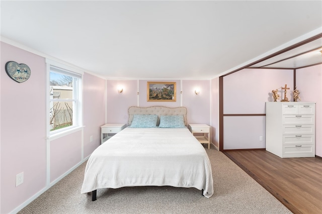 bedroom featuring hardwood / wood-style flooring