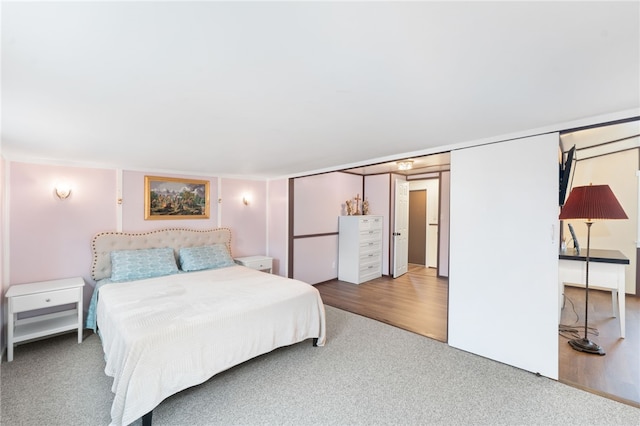 bedroom featuring hardwood / wood-style flooring