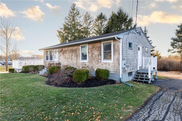 view of property exterior featuring a yard