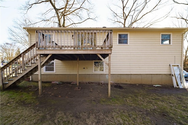 back of property with a deck