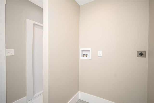 laundry area with electric dryer hookup and washer hookup