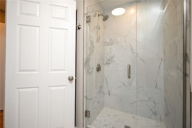 bathroom featuring an enclosed shower