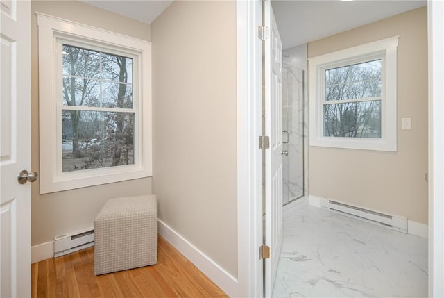 hallway with a baseboard radiator