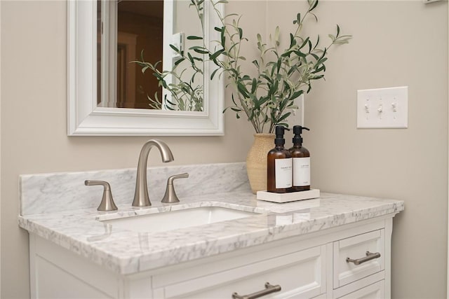 interior details featuring vanity and wet bar