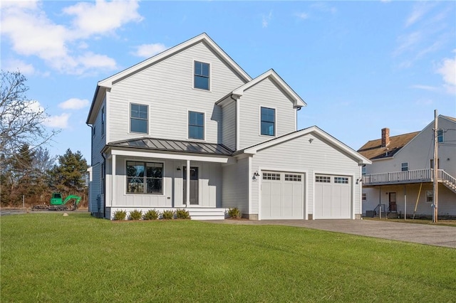 view of front facade with a front yard and a porch