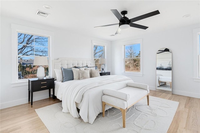 bedroom featuring ceiling fan and light hardwood / wood-style floors