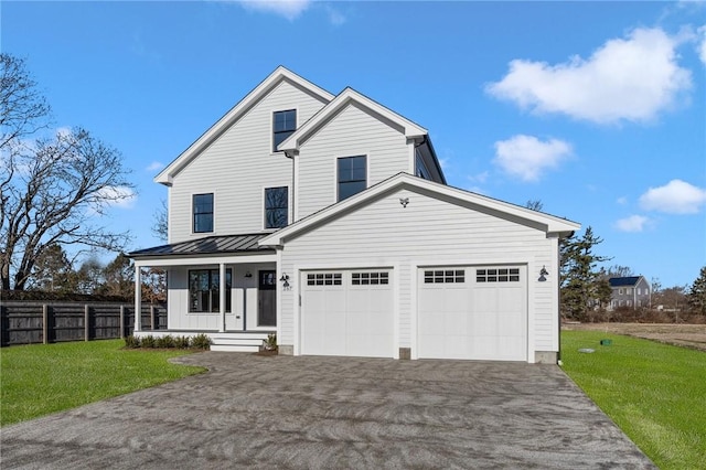 view of front of house with a porch and a front yard