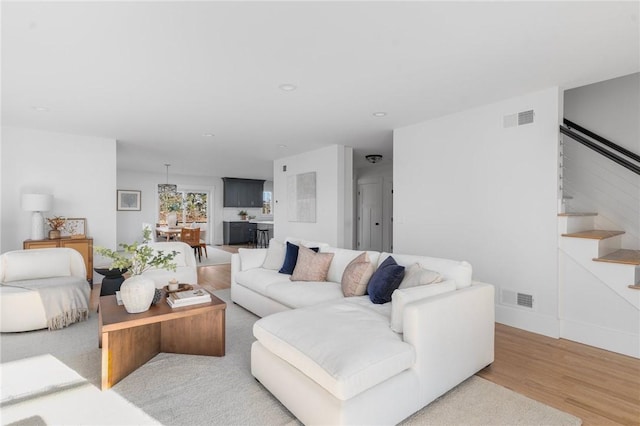 living room featuring light wood-type flooring