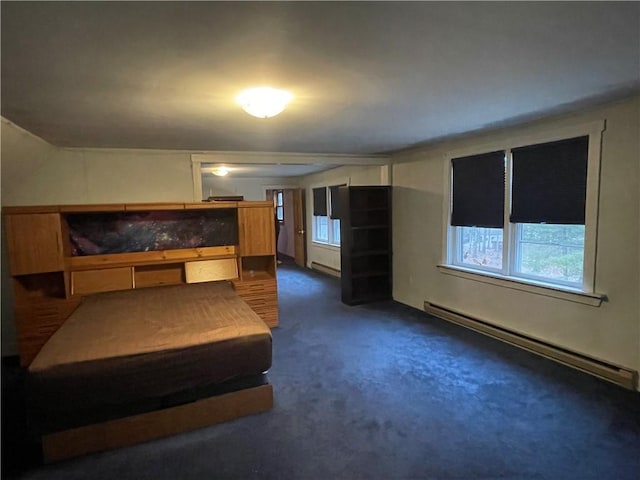 unfurnished bedroom featuring multiple windows, baseboard heating, and lofted ceiling