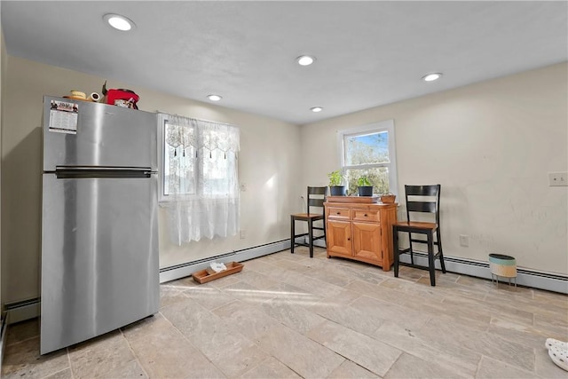 office space with a baseboard radiator