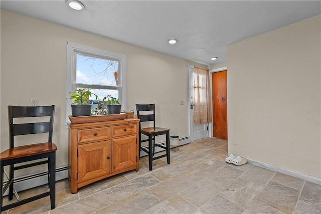 office area with a baseboard radiator