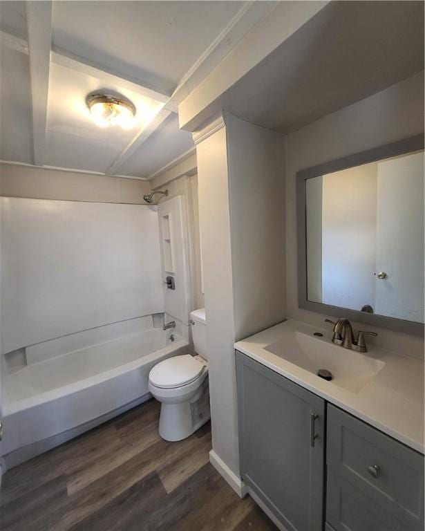 full bathroom with toilet, shower / washtub combination, vanity, and hardwood / wood-style flooring