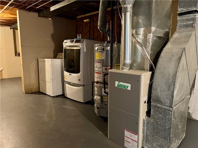 utilities with water heater and washer and clothes dryer