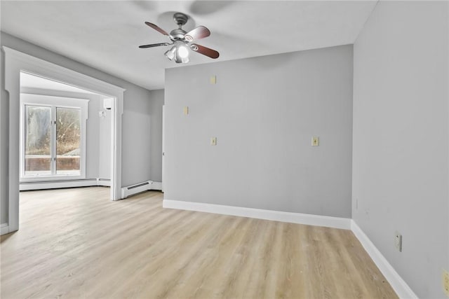 empty room featuring ceiling fan, a baseboard radiator, and light wood-type flooring