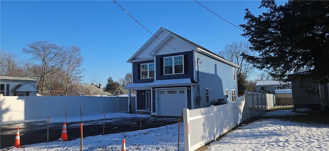 view of front of home with a garage