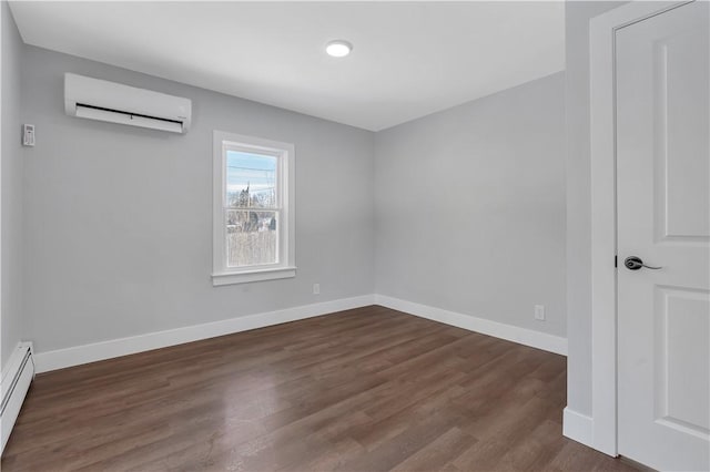 unfurnished room featuring baseboard heating, dark hardwood / wood-style flooring, and a wall mounted air conditioner