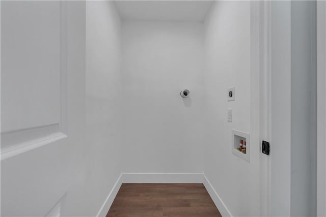 clothes washing area featuring hookup for an electric dryer, dark wood-type flooring, and hookup for a washing machine