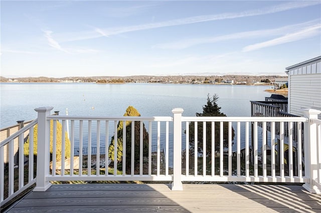 deck featuring a water view