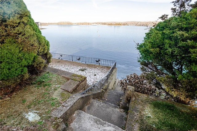 dock area featuring a water view