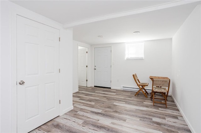 sitting room with light hardwood / wood-style flooring