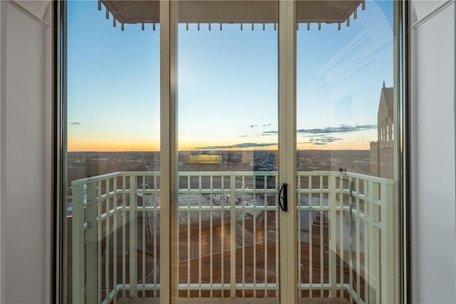 view of balcony at dusk