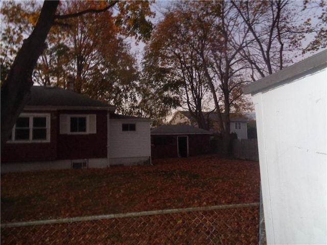 view of property exterior at dusk