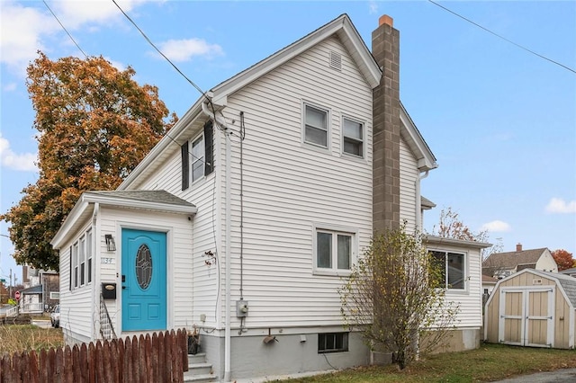 exterior space featuring a storage shed