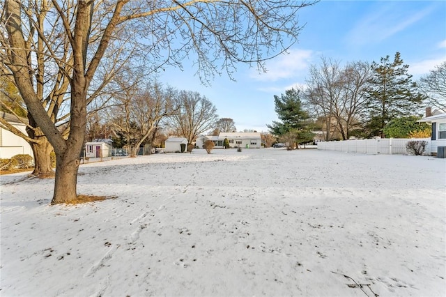 view of yard covered in snow