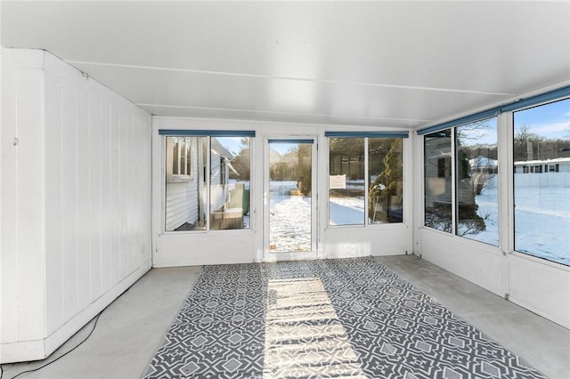 unfurnished sunroom featuring a healthy amount of sunlight