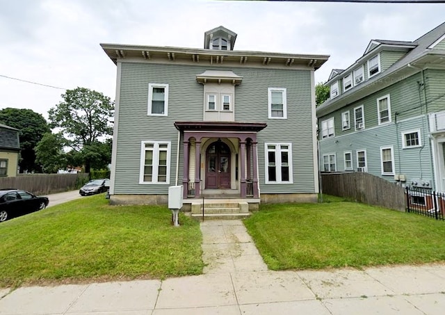 italianate home with a front lawn