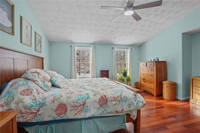 bedroom featuring ceiling fan and hardwood / wood-style floors