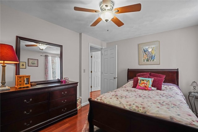 bedroom featuring hardwood / wood-style floors and ceiling fan