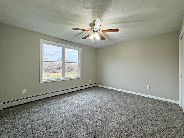 carpeted empty room featuring a textured ceiling and a baseboard heating unit