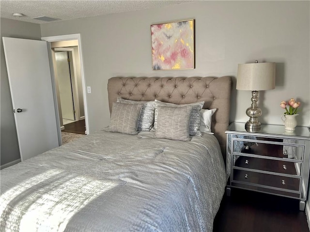 bedroom with a textured ceiling