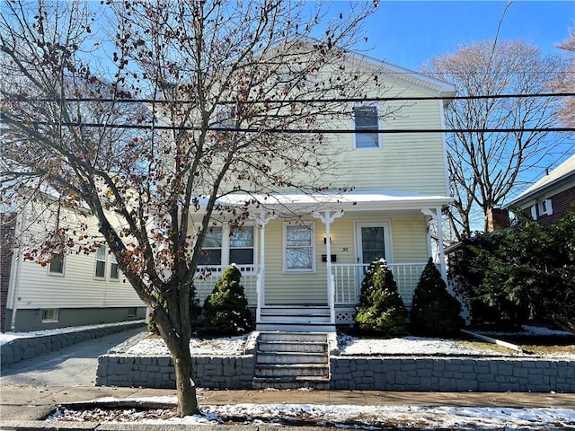 view of front of house featuring covered porch