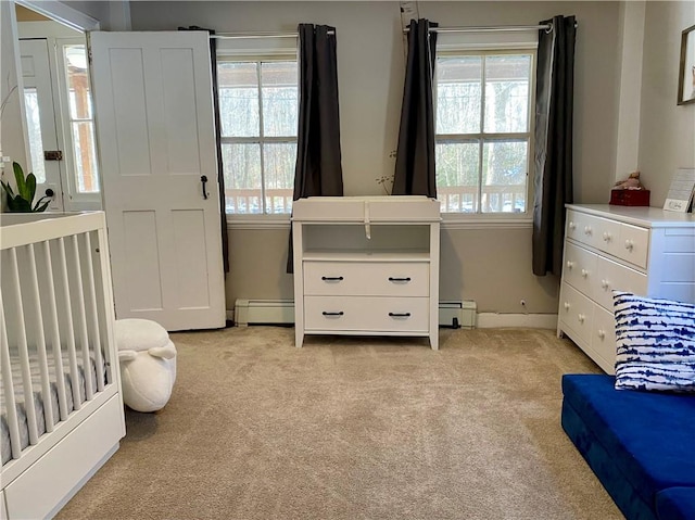 bedroom featuring light carpet and multiple windows