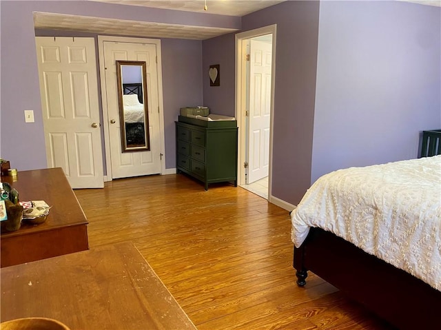 bedroom featuring light wood-type flooring