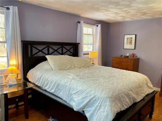 bedroom featuring hardwood / wood-style floors