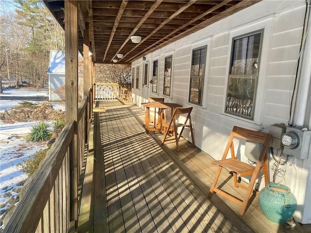 view of snow covered deck