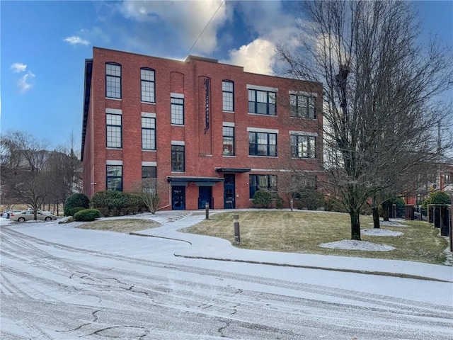 view of snow covered property